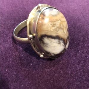 Beautiful ring, none adjustable, nice stone